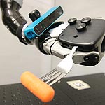 Hand-Mounted Camera Improves Robotic Dexterity