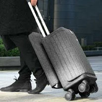 Rollogo Suitcase Charges as it Rolls