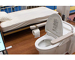 Bedside Flushable Toilet Eases Caretaker Duties, Adds Dignity