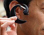 Ear-Worn PC Controlled by Facial Movements