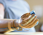 Hand Prosthesis with a Sense of Touch