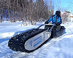 MTT-136 Sled Tows Through Snow and Mud
