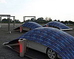 Retractable Solar Car Cover Charges While it Protects