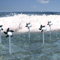 Turbines Harvest Waves and Protect Shores