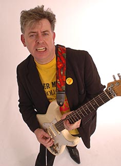 image of Peter Cook playing guitar